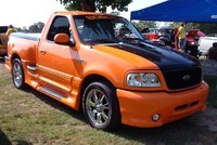 12007